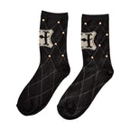 Image produit Harry Potter - Chaussettes avec logo Hogwarts et clous noirs