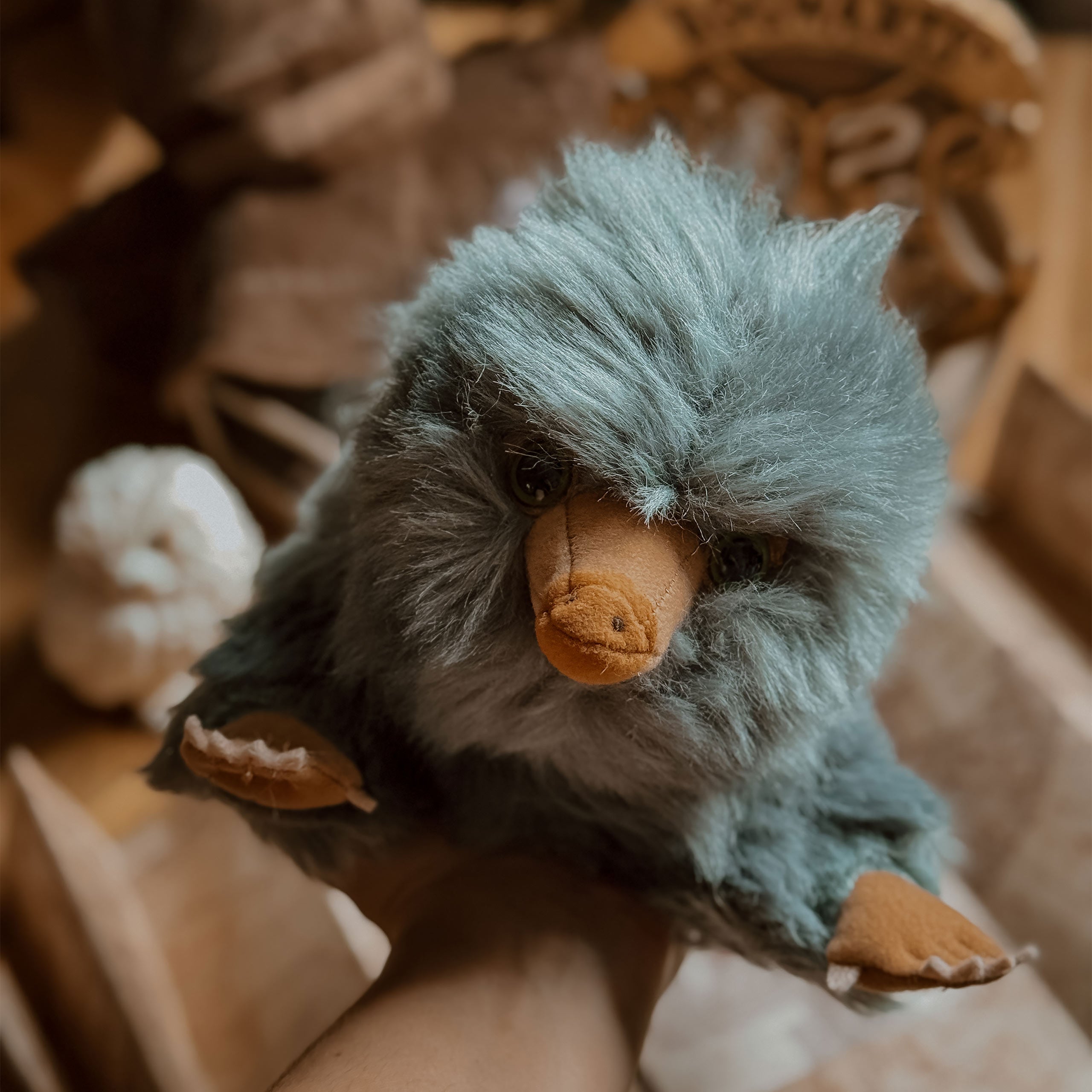 Image produit Figurine en peluche Bébé Niffleur 22 cm gris - Animaux fantastiques