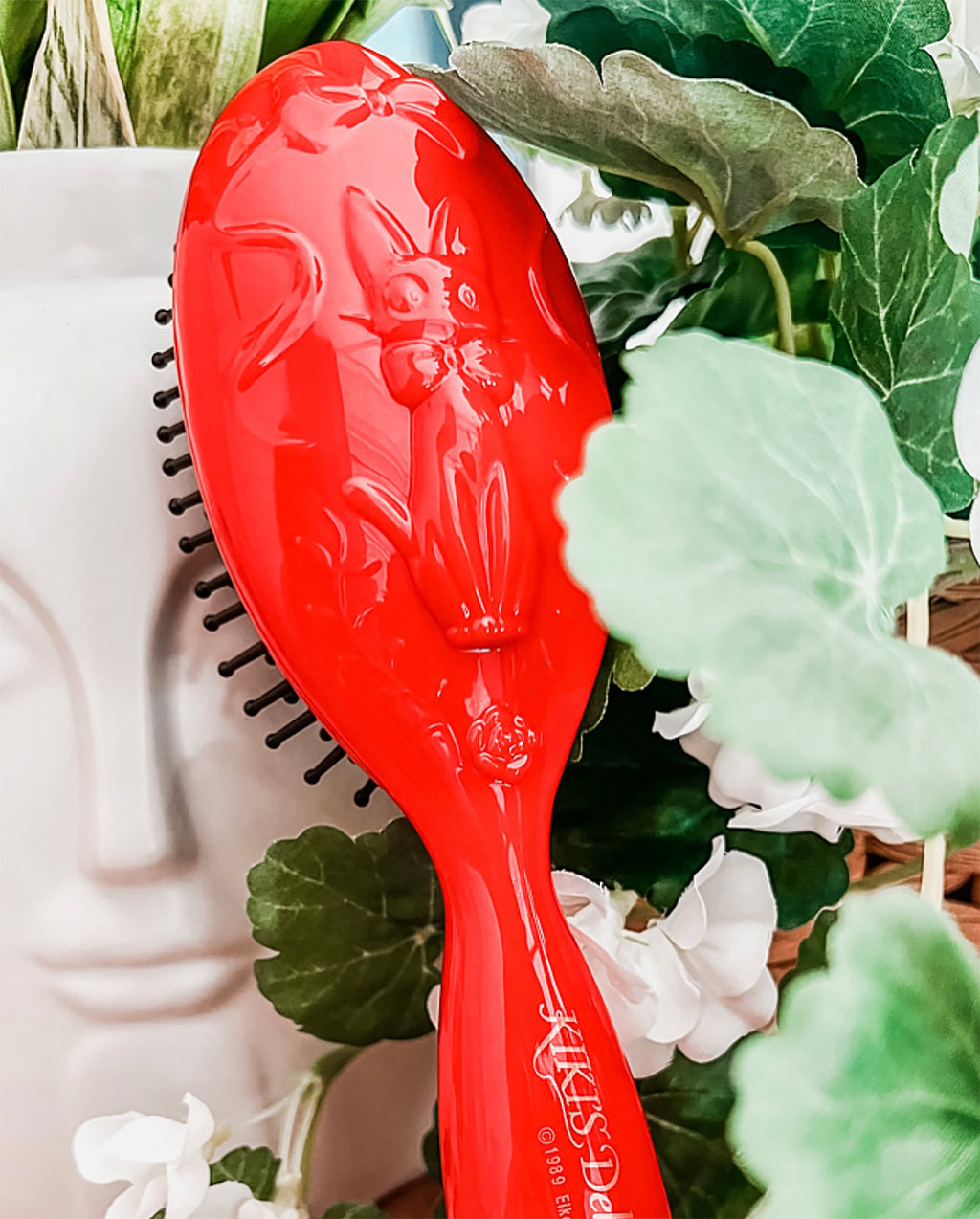 Image produit Le service de livraison de Kiki - Brosse à cheveux Jiji