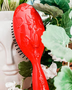 Image produit Le service de livraison de Kiki - Brosse à cheveux Jiji
