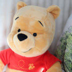 Image produit Winnie l'ourson - Figurine en peluche assise