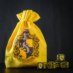 Image produit Harry Potter - Set de dés RPG Hufflepuff 5pcs avec sac à dés jaune