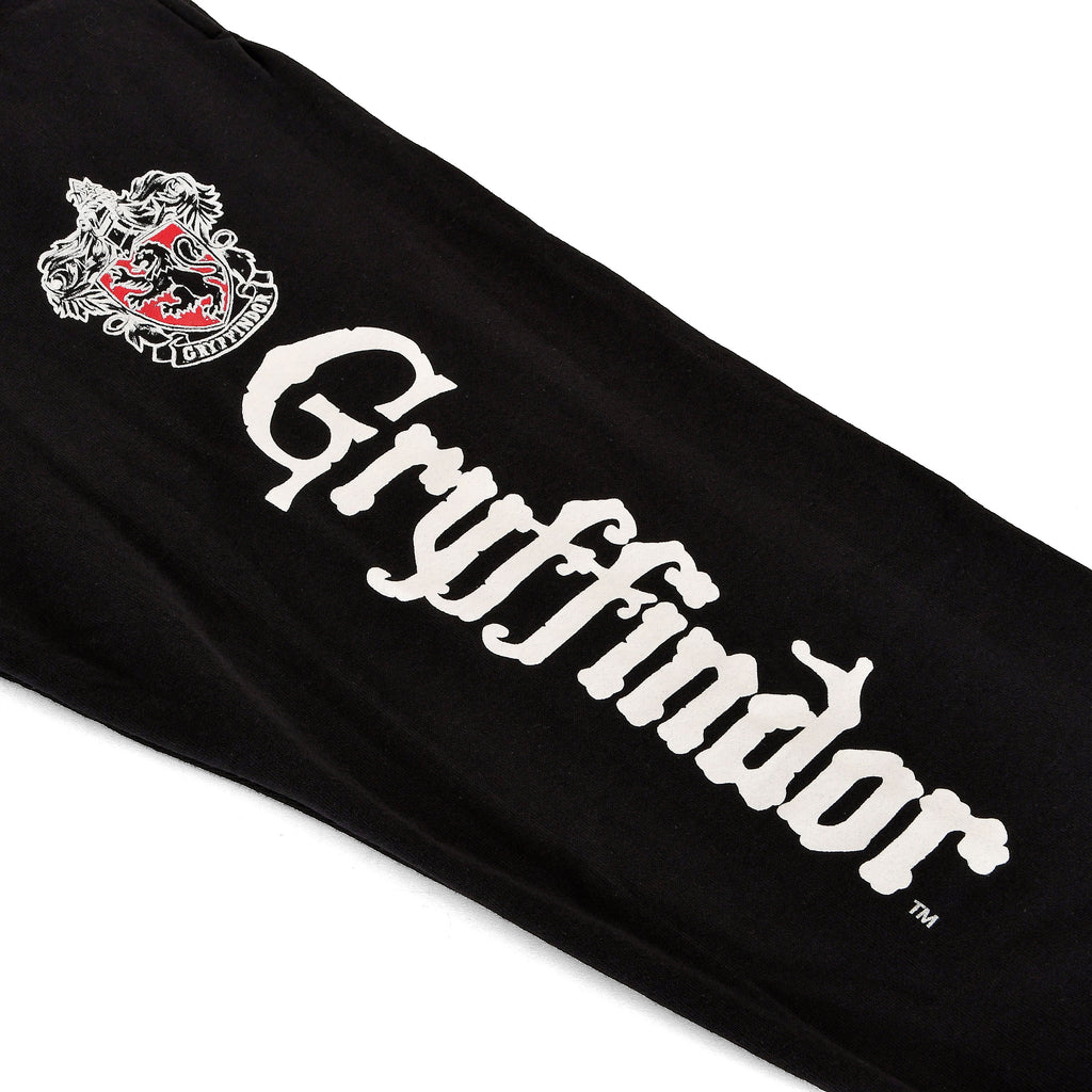 Image produit Harry Potter - Gryffondor Pantalon de survêtement noir qui brille dans le noir