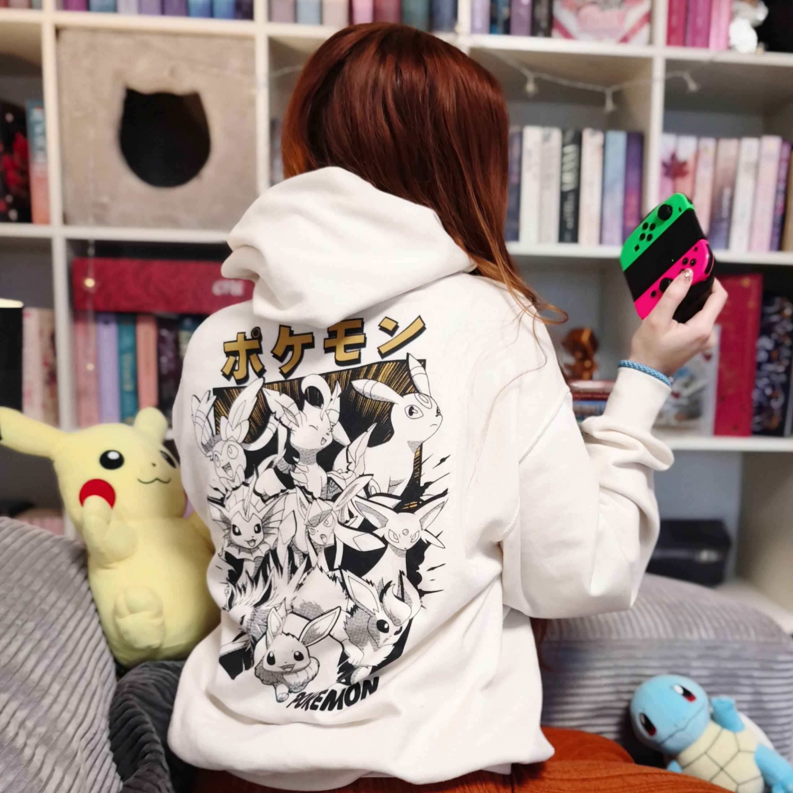 Image produit Pokémon - Sweat à capuche Katakana Évolutions d'Évoli
