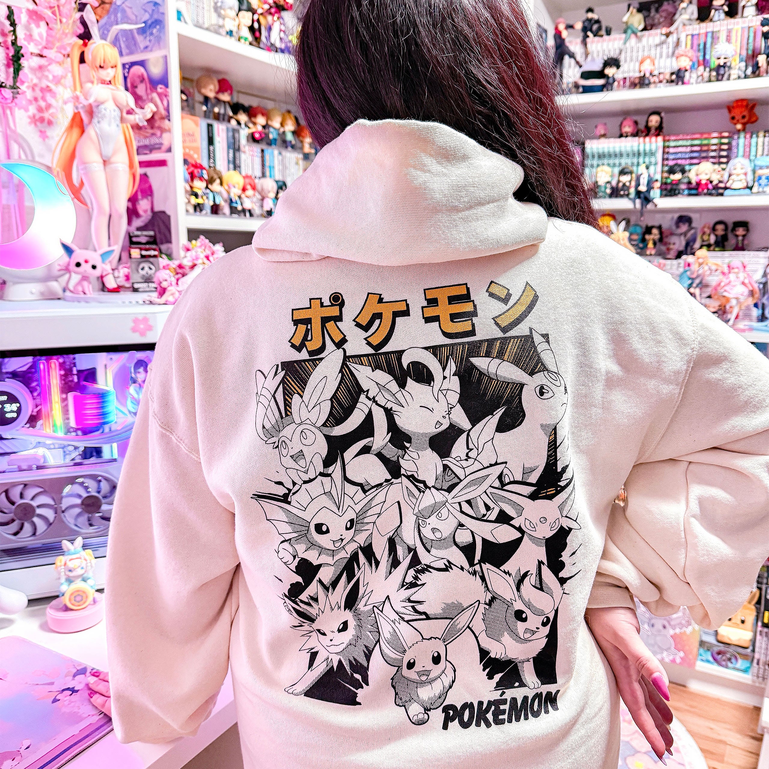 Image produit Pokémon - Sweat à capuche Katakana Évolutions d'Évoli