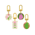 Image produit Wicked - Pink Goes Good With Green Coffret valise avec bracelet à breloques