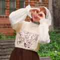 Image produit T-shirt beige pour les fans de Coco et Atelier of Witch Hat